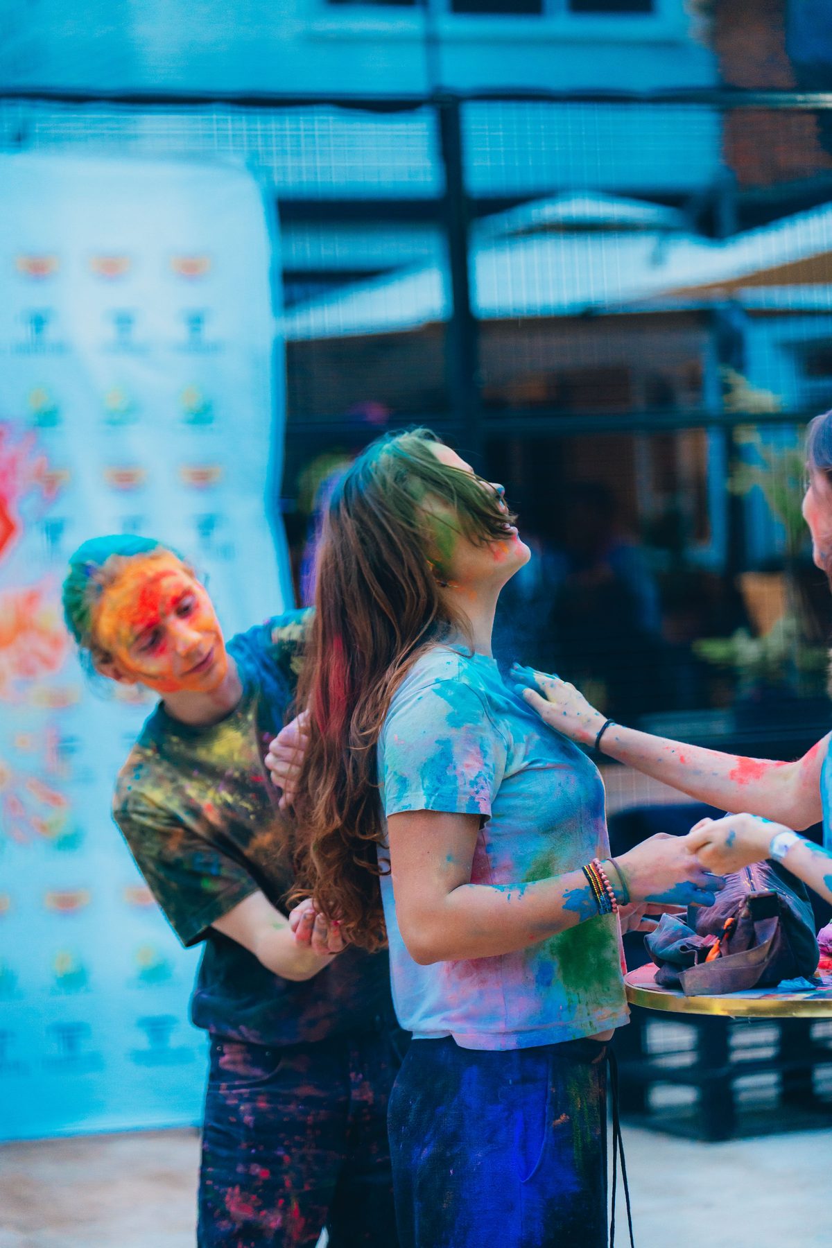 Friends covered in Holi colours