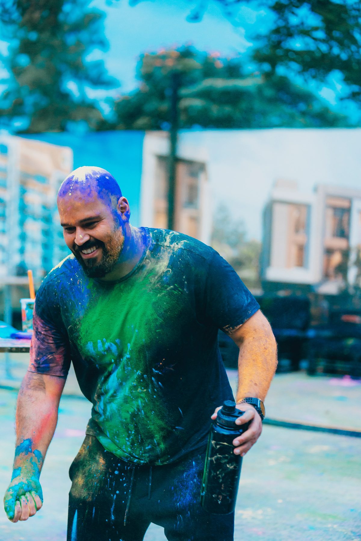 Laughing guest covered in powder